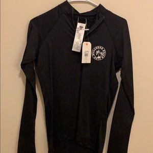 Women’s billabong wetshirt/swim cover.